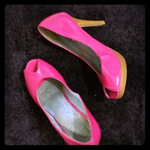 Hot pink peep toe pumps